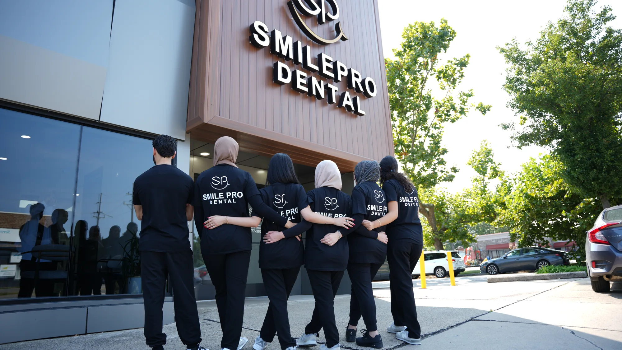 The SmilePro Dental team outside the practice in Dearborn Heights, Michigan